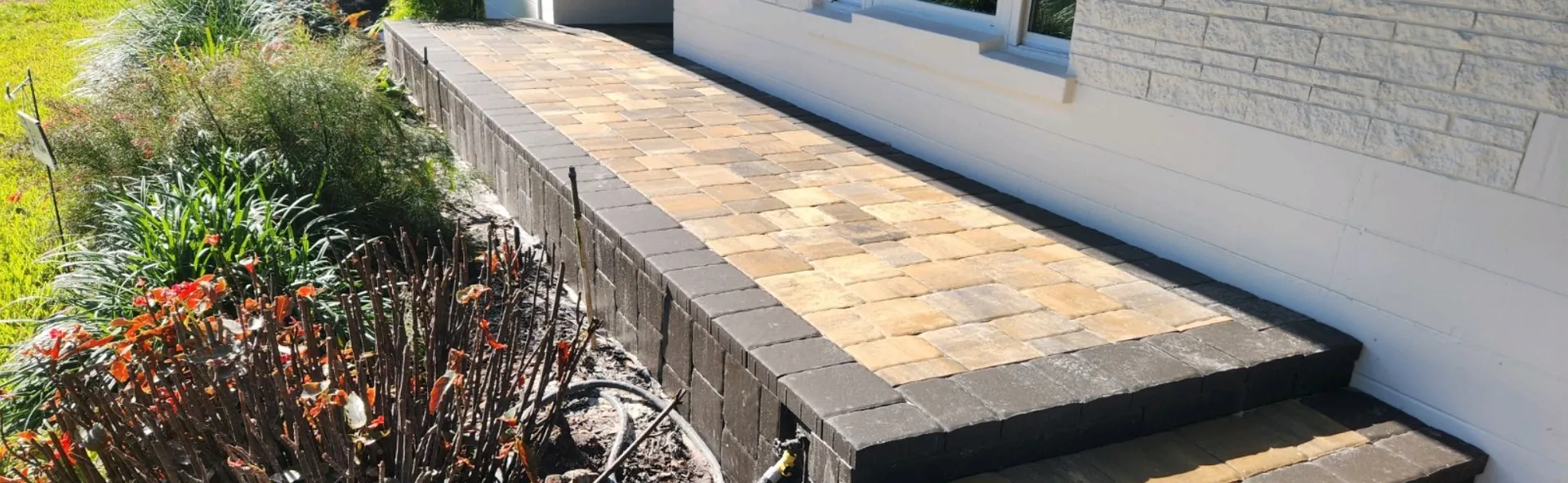 Close-up of a paver seat wall cap